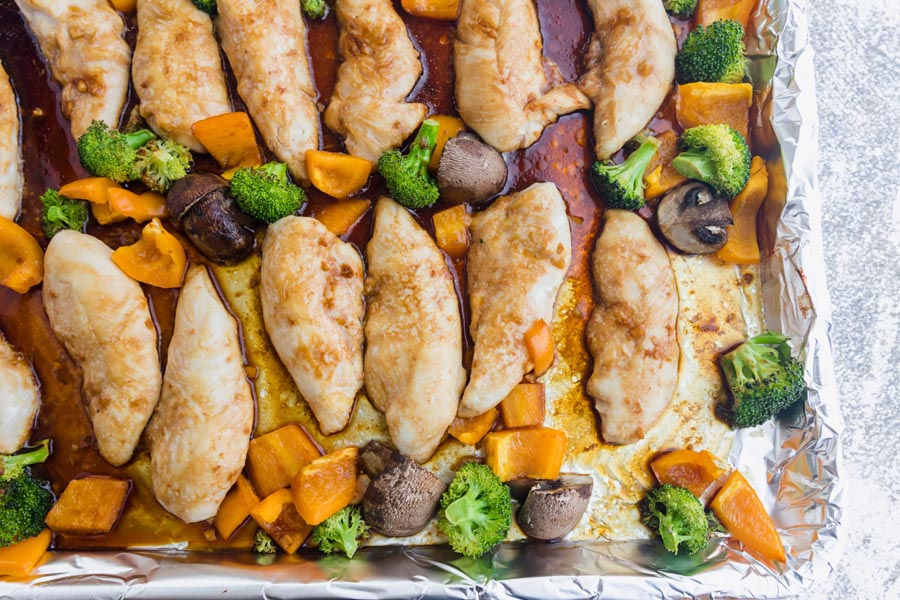 baked chicken on a sheet pan with veggies