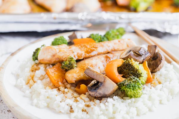 chicken teriyaki with vegetables over cauliflower rice