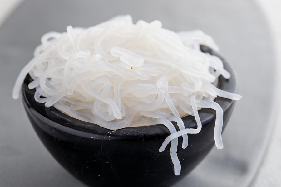 close up of rubbery shirataki noodles in a bowl