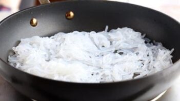 konjac noodles cooking in a skillet