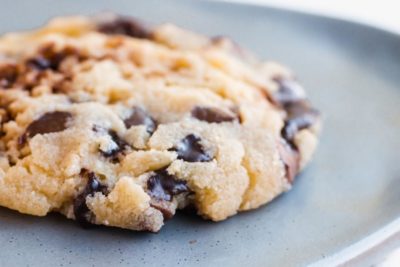 chewy keto chocolate chip cookie with melted chips