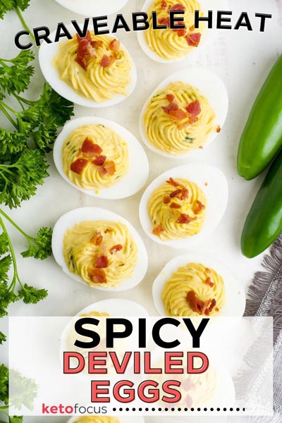 Spicy deviled eggs topped with bacon with jalapeno chunks inside.