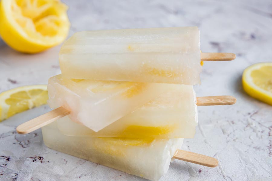 keto lemonade ice pops stacked up