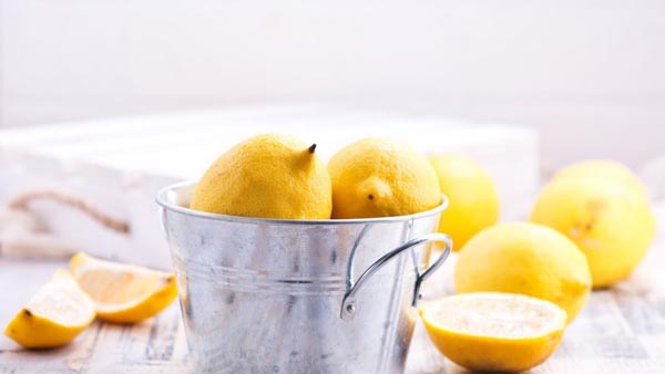 lemons in a silver bucket