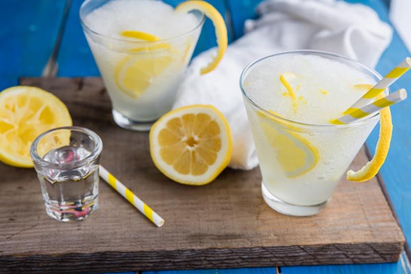 blended lemonade and vodka drink on a wooden slab