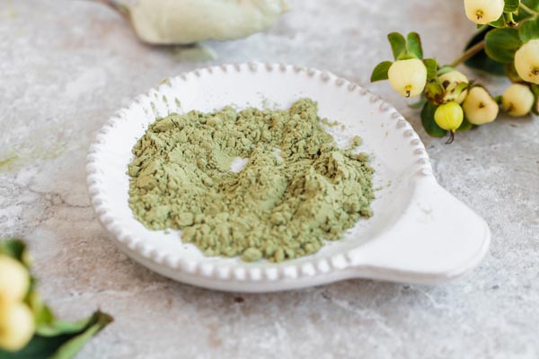 powder matcha green tea in a small bowl