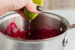 keto cranberry sauce cooking in a saucpan